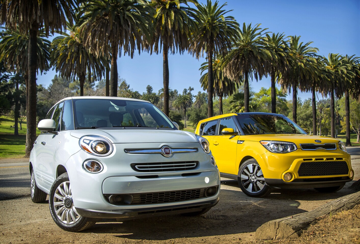 The all-new Fiat 500L, left, and the redesigned Kia Soul are in a quirky "toaster" class of subcompact cars that also includes the Nissan Cube and Juke, and the Scion xB.