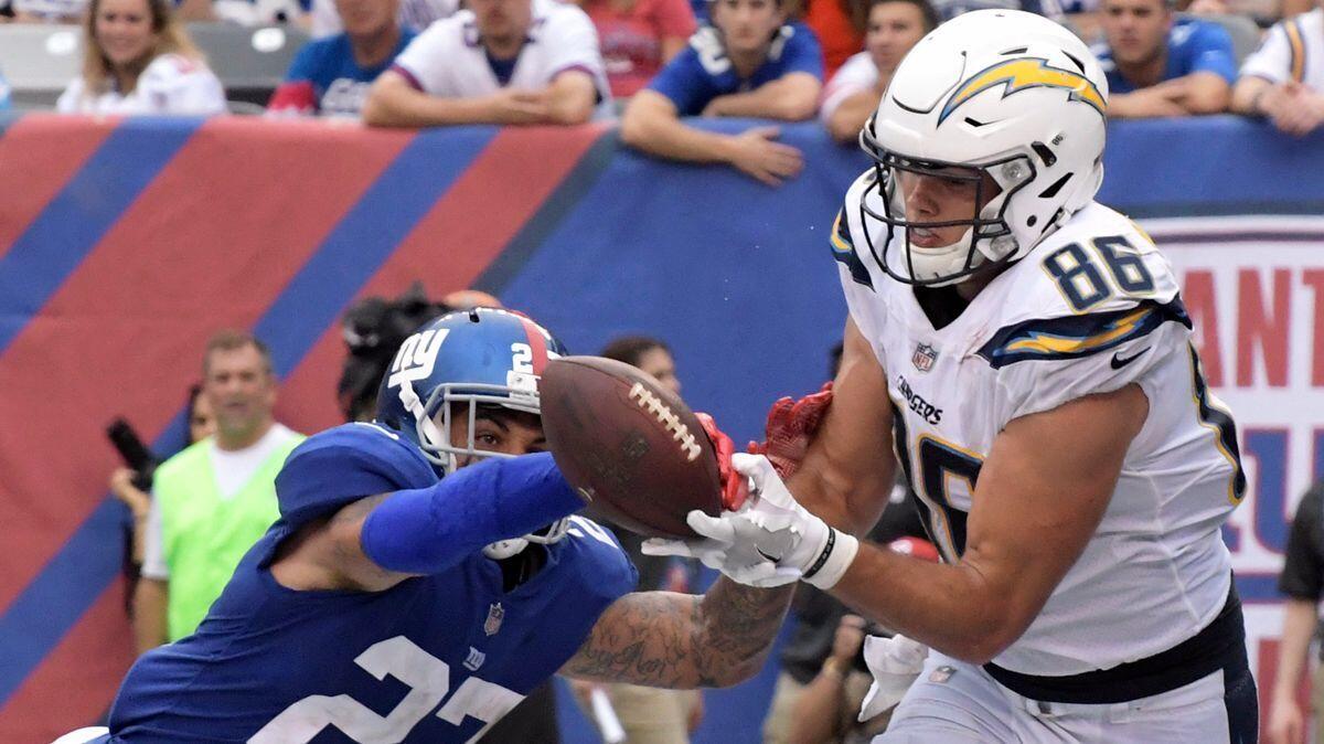 The Chargers' Hunter Henry, shown in action against the New York Giants, made two crucial catches on the team's final drive Sunday.