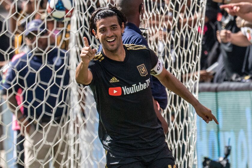 LOS ANGELES, CA - OCTOBER 6: Carlos Vela #10 of Los Angeles FC celebrates his 3rd goal during Los Angeles FC's MLS match against Sporting Kansas City at the Banc of California Stadium on October 6, 2019 in Los Angeles, California. Los Angeles FC won the match 3-1 (Photo by Shaun Clark/Getty Images)