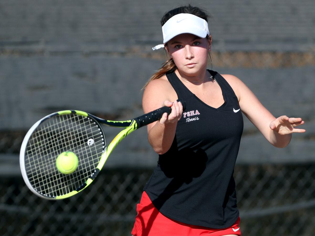Flintridge Sacred Heart Academy tennis singles player Mary Jane Von de Ahe returns the ball in home game vs. Century or Torrance in CIF Southern Section Division IV first-round playoff match at Scholl Canyon Golf & Tennis Club in Glendale on Wednesday, Nov. 6, 2019.