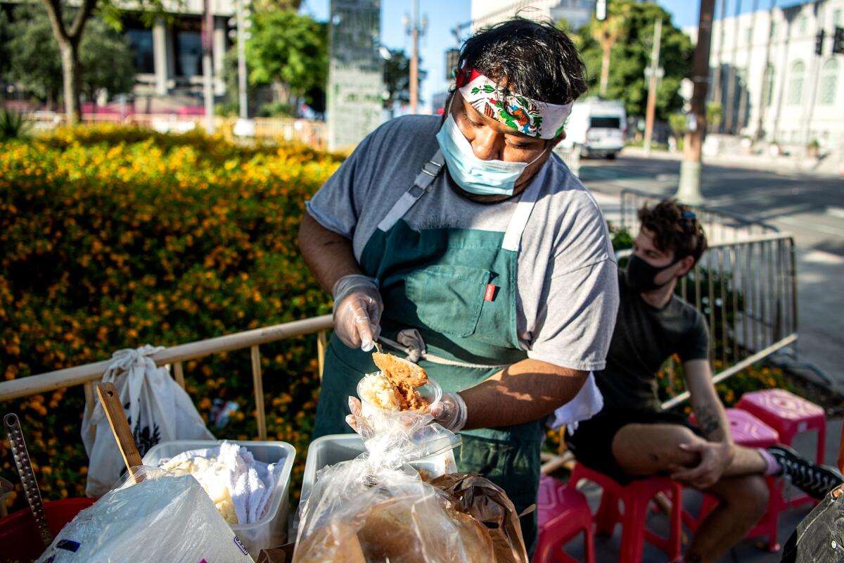 Chef Rogelio Hernandez sets up across from Los Angeles City Hall about twice a week.