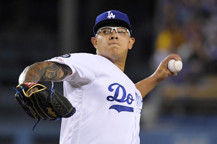 Los Angeles Dodgers starting pitcher Julio Urias throws during the second inning of the team's baseball game against the Colorado Rockies on Tuesday, Sept. 3, 2019, in Los Angeles. (AP Photo/Mark J. Terrill)