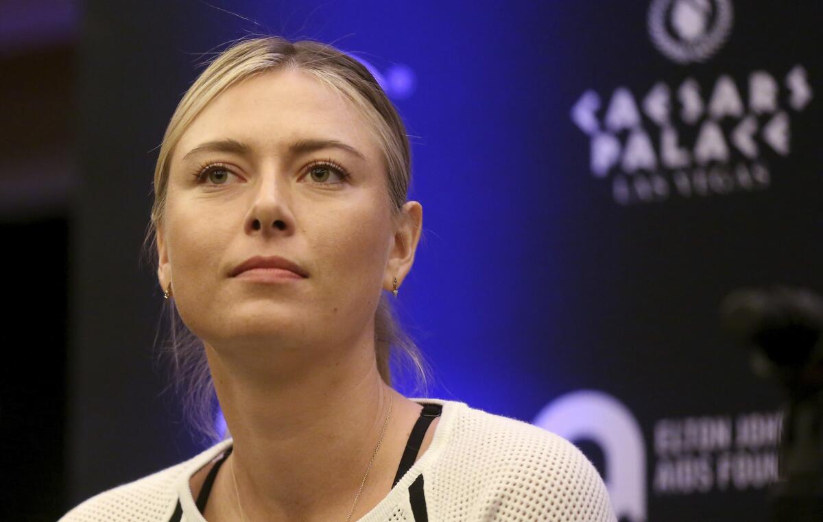 Maria Sharapova speaks to members of the media prior to a World Team Tennis exhibition in Las Vegas on Oct. 10, 2016.