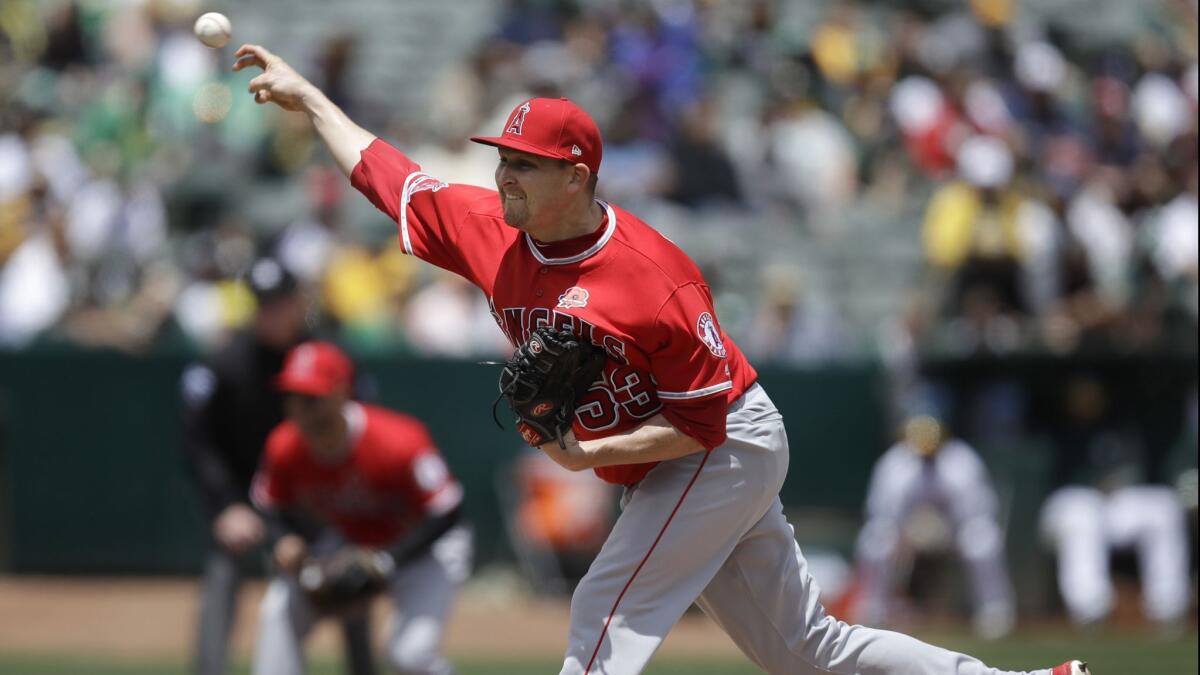 Angels starter Trevor Cahill delivers during the first inning against the Oakland Athletics on May 27.