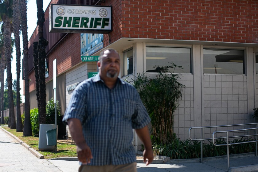 William Kemp walks past the sheriff's station in Compton.