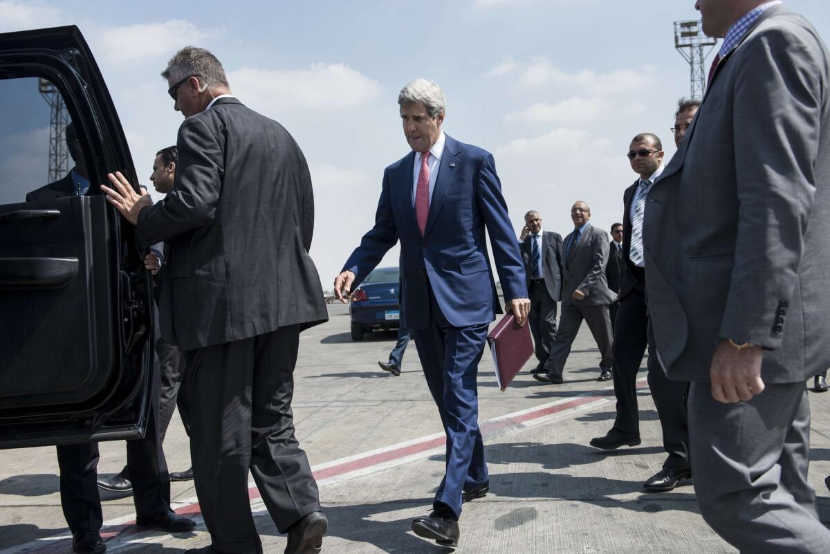 Secretary of State John F. Kerry arrives at Cairo International Airport on Sept. 13 for more talks aimed at forging a coalition to fight the Islamic State.