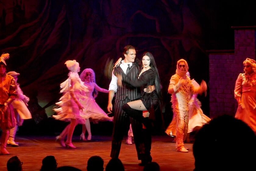 Gomez (Nick Siljander) and Morticia (Reese Taylor) 