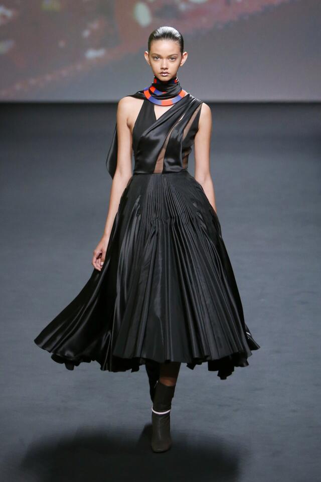 A model wears a creation by fashion designer Raf Simons for Christian Dior's Haute Couture collection.