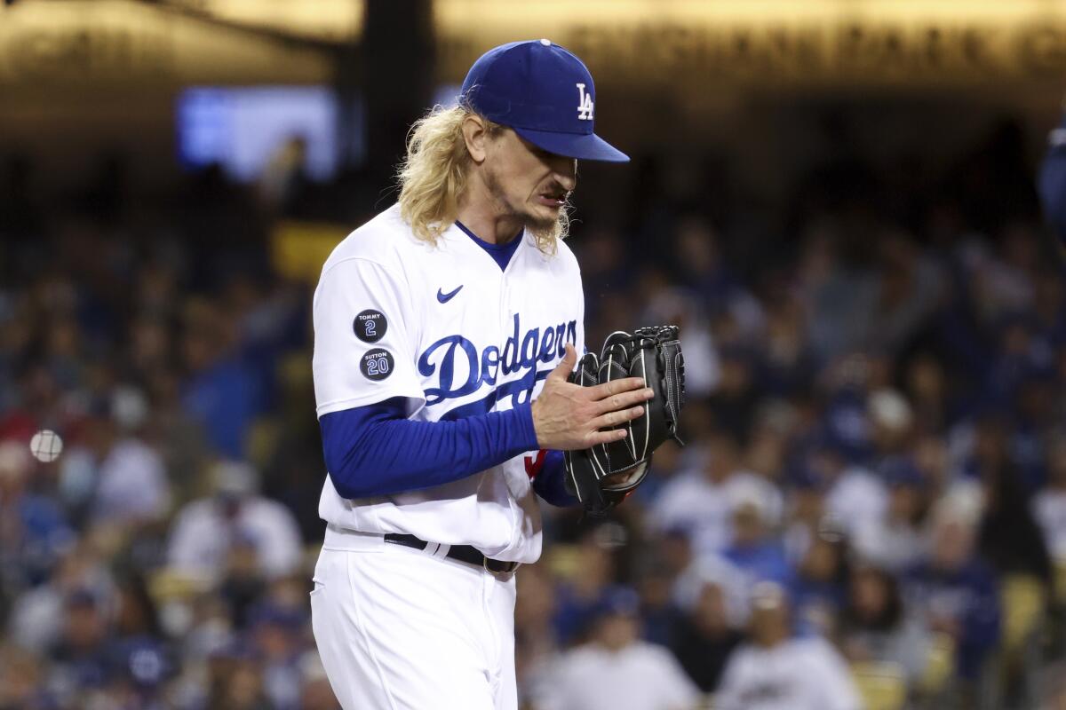 Dodgers reliever Phil Bickford reacts during the sixth inning against the Braves.
