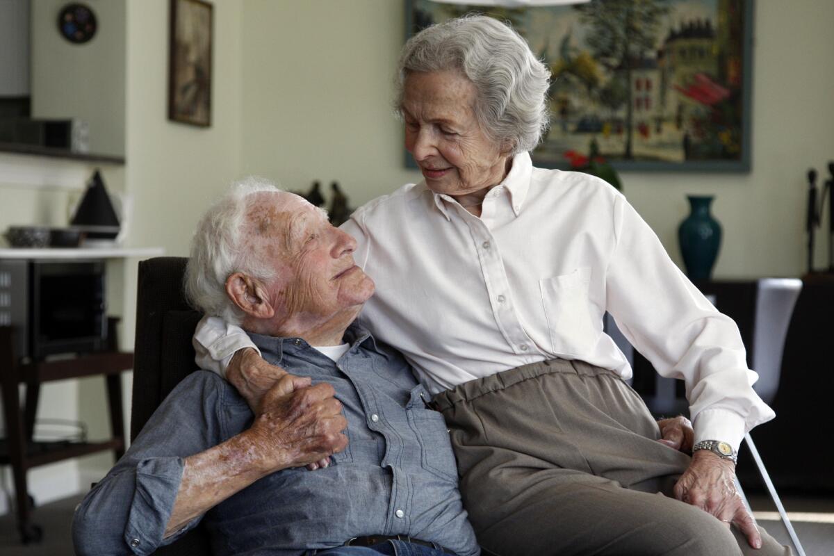 Morrie Markoff, 99, and his wife, Betty, 97, are shown in their home in 2013.