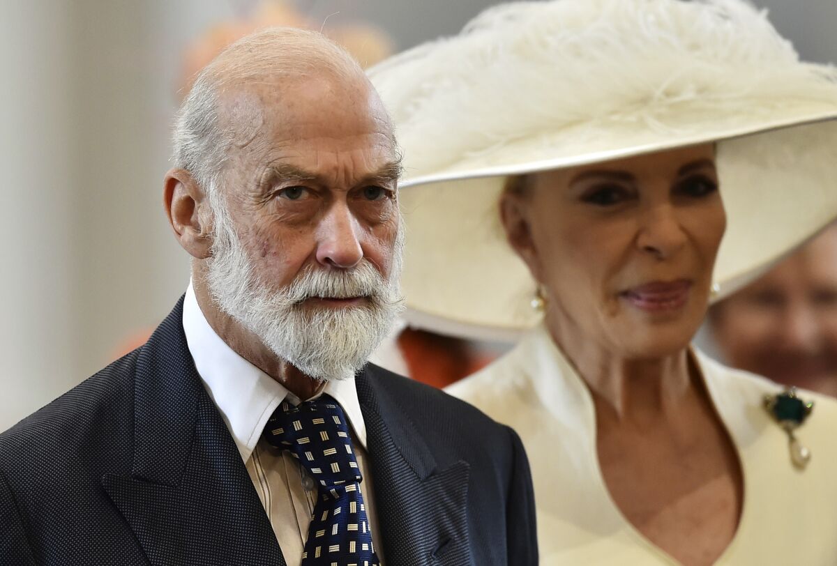 FILE - In this Friday, June 10, 2016 file photo, Britain's Prince Michael of Kent and Princess Michael of Kent arrive at St Paul's Cathedral in London. An investigative report by British media published Sunday,May 9, 2021 says that Queen Elizabeth II’s cousin, Prince Michael of Kent, was willing to use his royal status for personal profit and to seek favors from Russia’s President Vladimir Putin. The undercover investigation by the Sunday Times and Channel 4 saw reporters posing as investors of a fake South Korean gold company. (Ben Stansall/Pool Photo via AP, file)