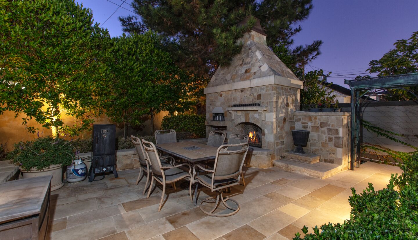 The patio with a fireplace.