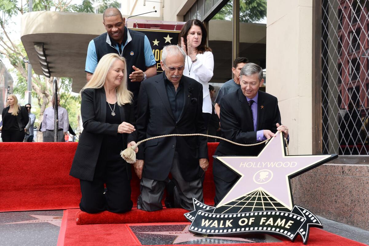 Ralph Lawler, bottom center, is honored with a star on the Hollywood Walk of Fame on March 3, 2016.