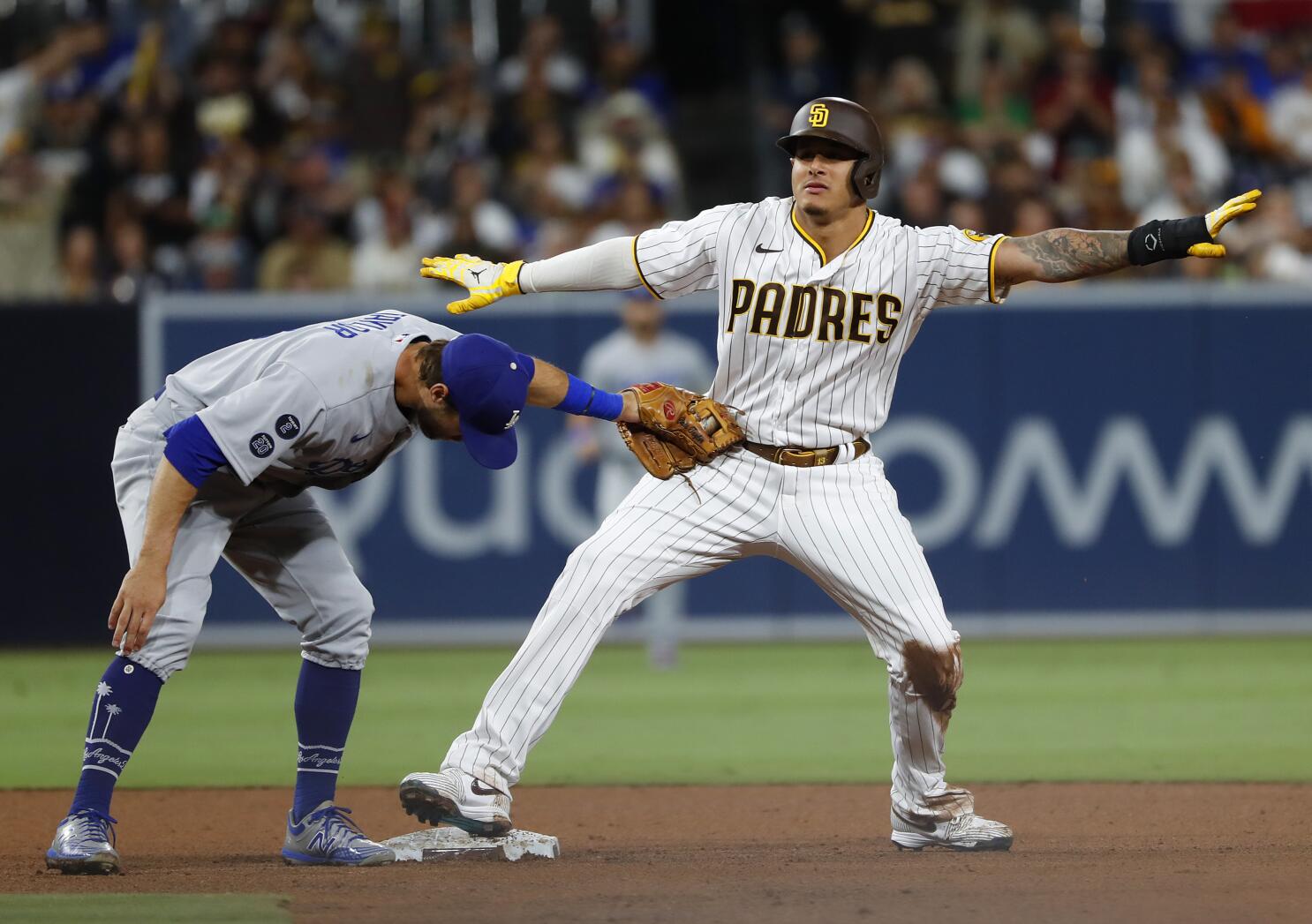 MLB/ Yu Darvish pitches Manny Machado-less Padres past D-backs