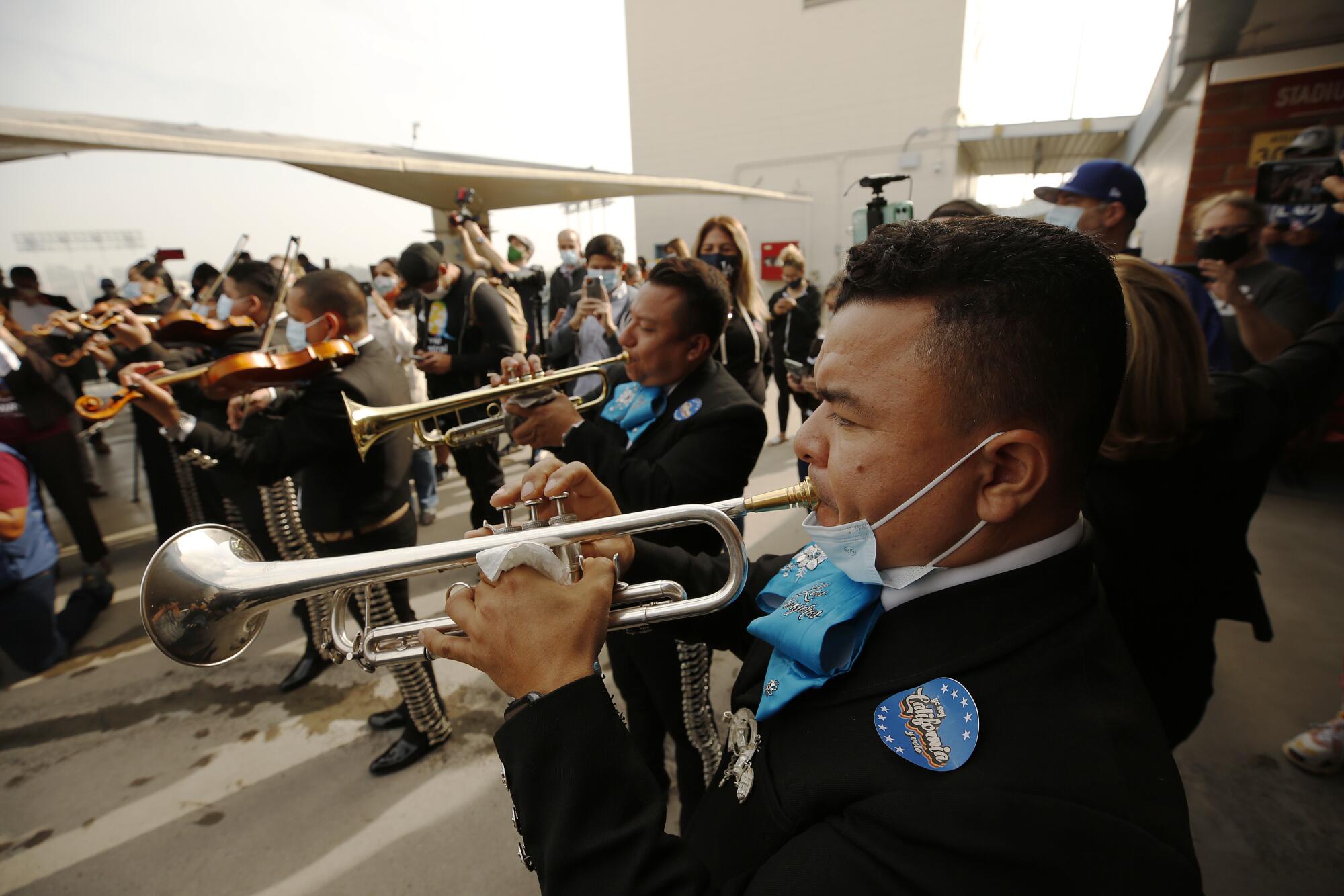 Mariachi Los Pasajeros play for voters on election day at Dodger Stadium in Elysian Park. 