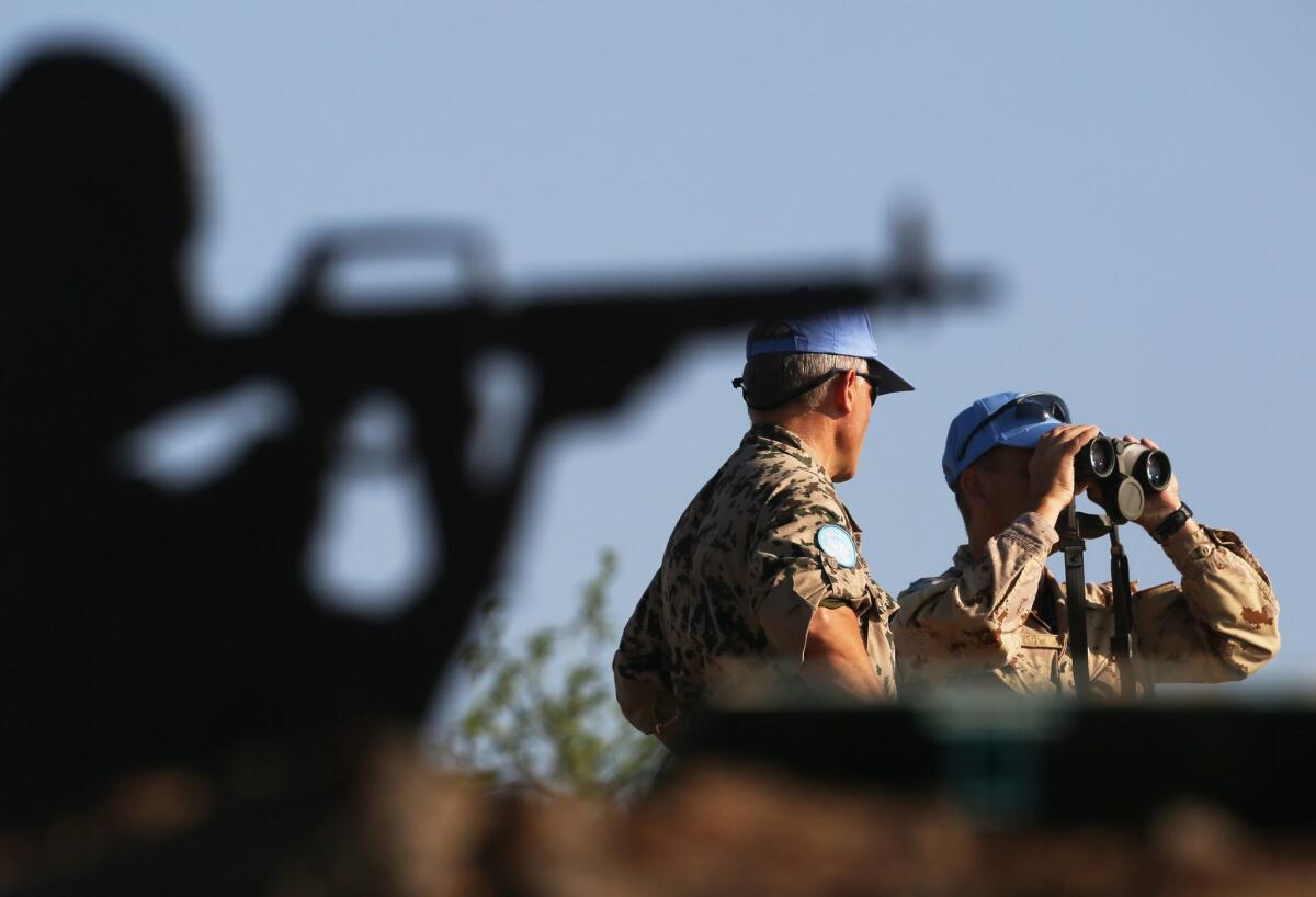 U.N. peacekeepers monitor the Israeli-Syrian border in the Golan Heights on Aug. 31.