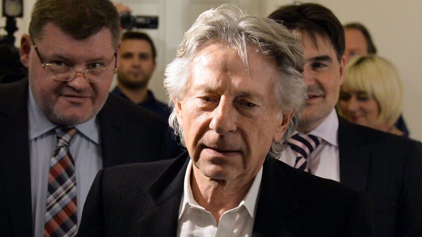Roman Polanski arrives for a news conference at a court in Krakow in 2015. On Tuesday, Poland's Supreme Court upheld the lower court's decision to reject a bid to extradite the filmmaker to the U.S. in his decades-old statutory rape case.