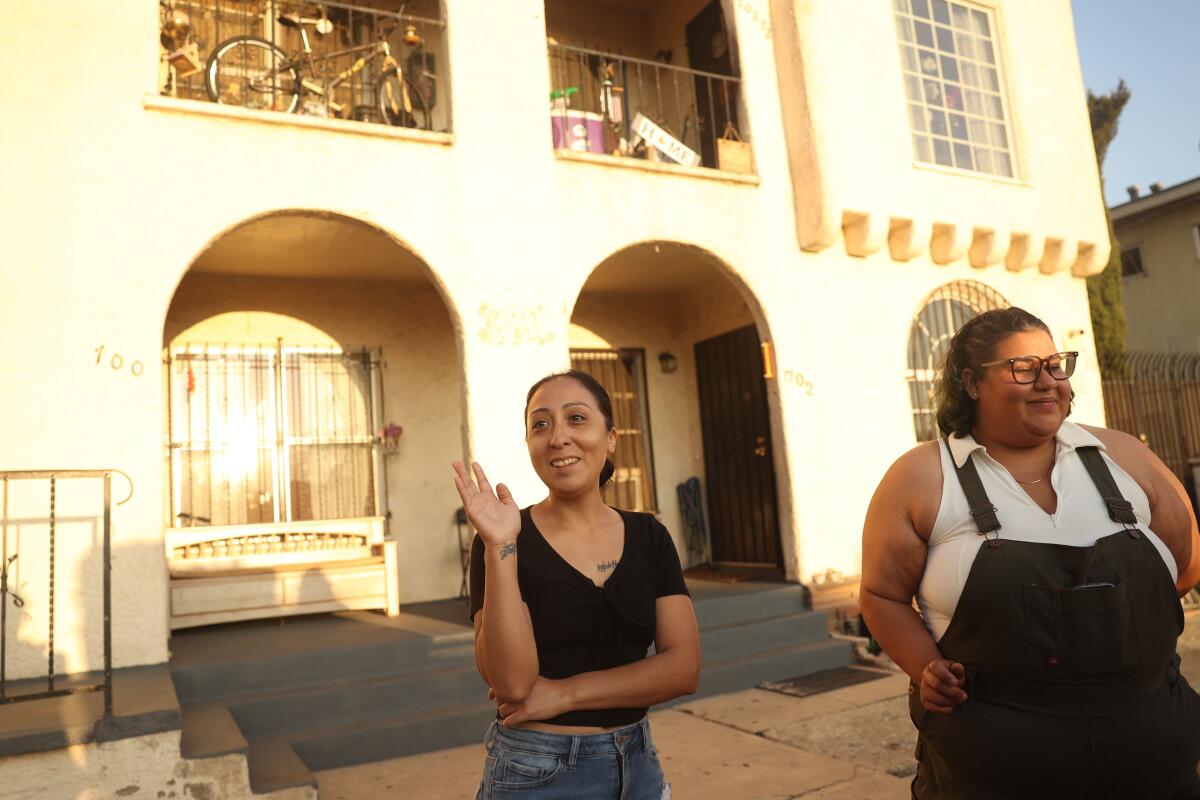 Destiny Jaramillo, left, alongside Mariana Puche Hernandez, right, in front of their apartment complex on Simmons Avenue.