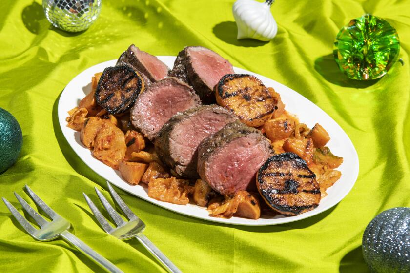 QUEENS, NY - Nov 26, 2019 - Genevieve Ko Recipes for the holidays, using ingredients from Costco. - Grilled Beef Tenderloin with Persimmon Kimchee