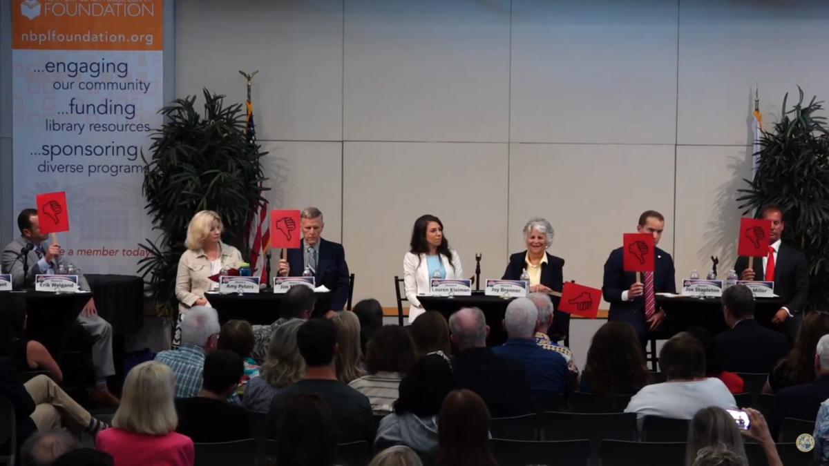Candidates answer a question.