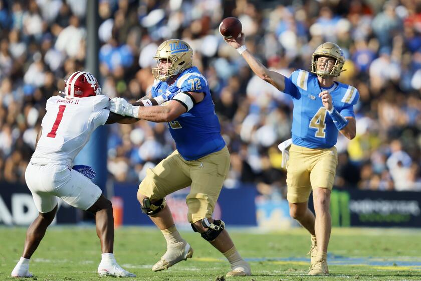 UCLA quarterback Ethan Garbers passes against Indiana in the first half Saturday at the Rose Bowl.