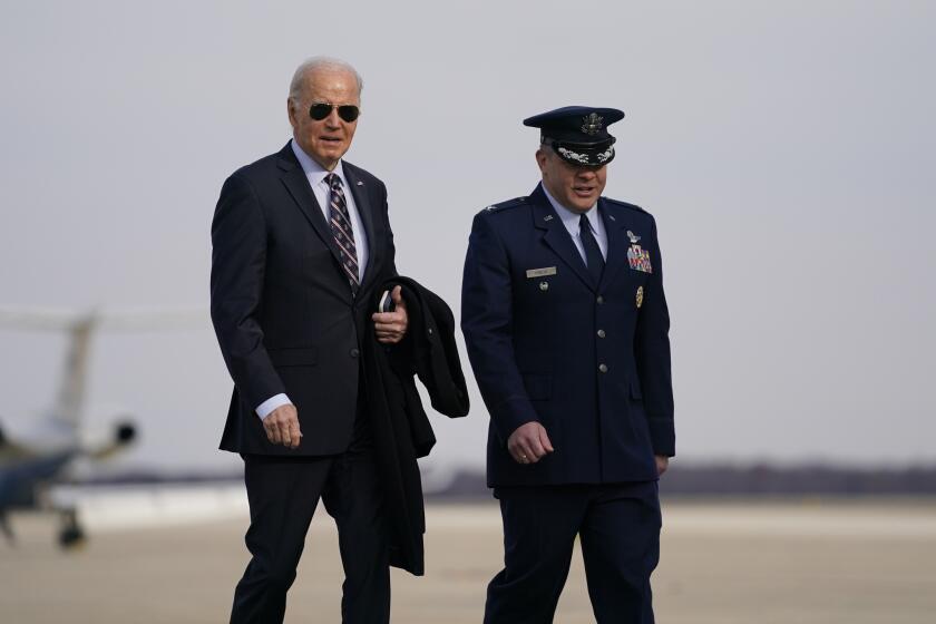President Joe Biden walks to board Air Force One for a trip to Boston to attend campaign fundraisers, Tuesday, Dec. 5, 2023, in Andrews Air Force Base, Md. (AP Photo/Evan Vucci)