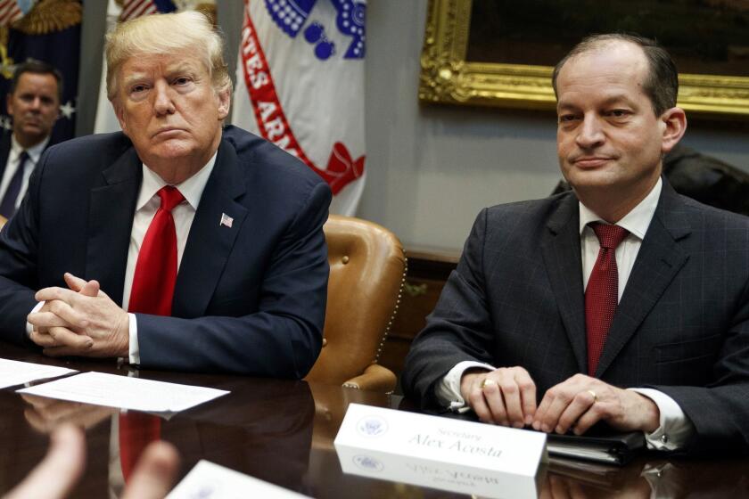 FILE - In this Sept. 17, 2018, file photo, President Donald Trump, left, and Labor Secretary Alexander Acosta listen during a meeting of the President's National Council of the American Worker in the Roosevelt Room of the White House in Washington. The arrest of billionaire financier Jeffrey Epstein on child sex trafficking charges is raising new questions about the future of Acosta as well as Epsteins relationships with several major political figures, including President Donald Trump and former President Bill Clinton. (AP Photo/Evan Vucci, File)