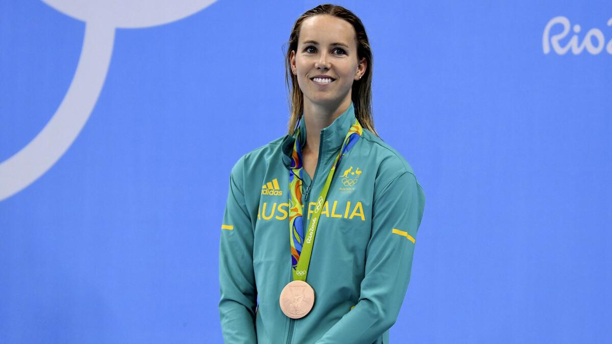 Australian swimmer Emma McKeon receives her bronze medal for the 200 freestyle.