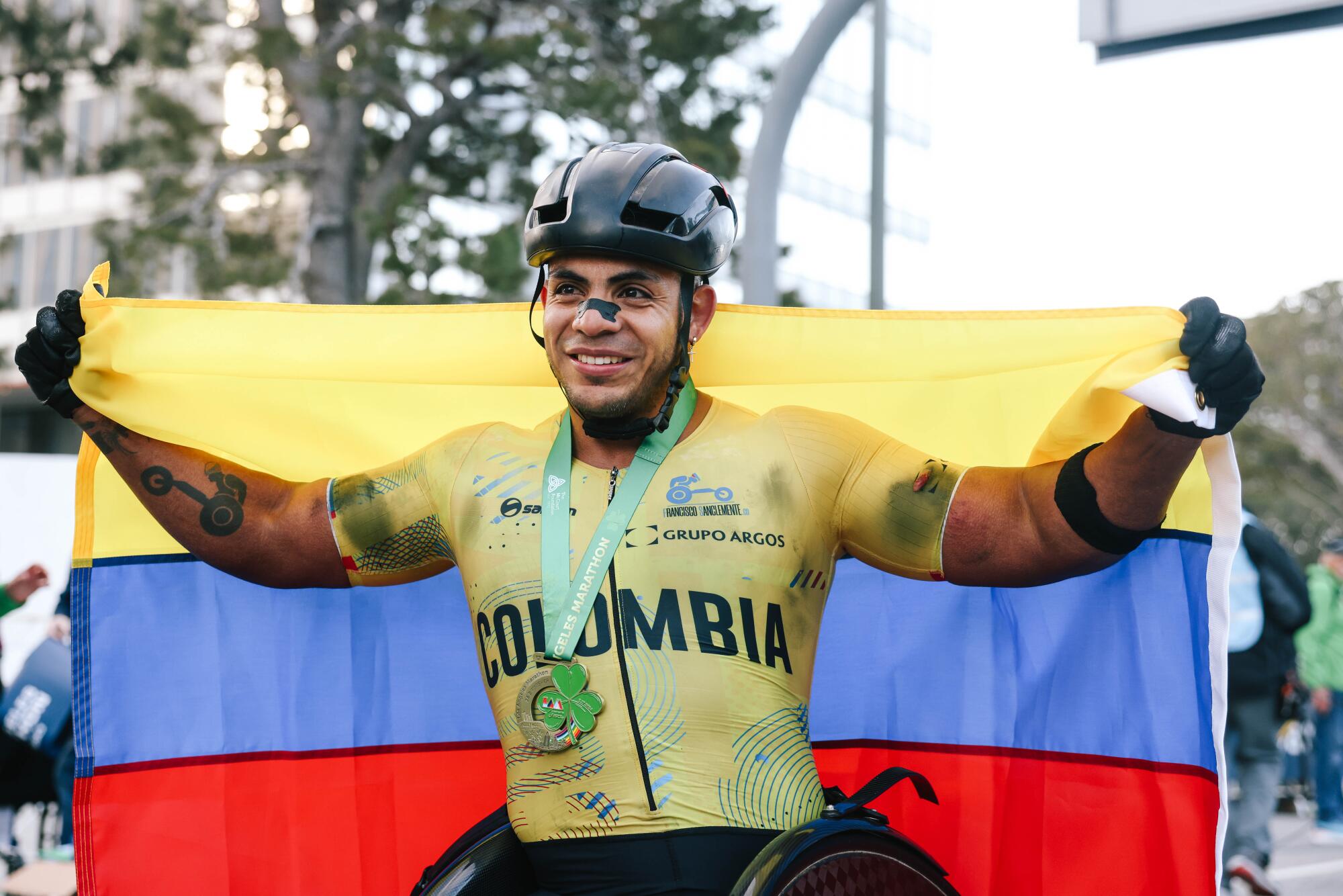 Francisco Sanclemente is the winner in a wheelchair.