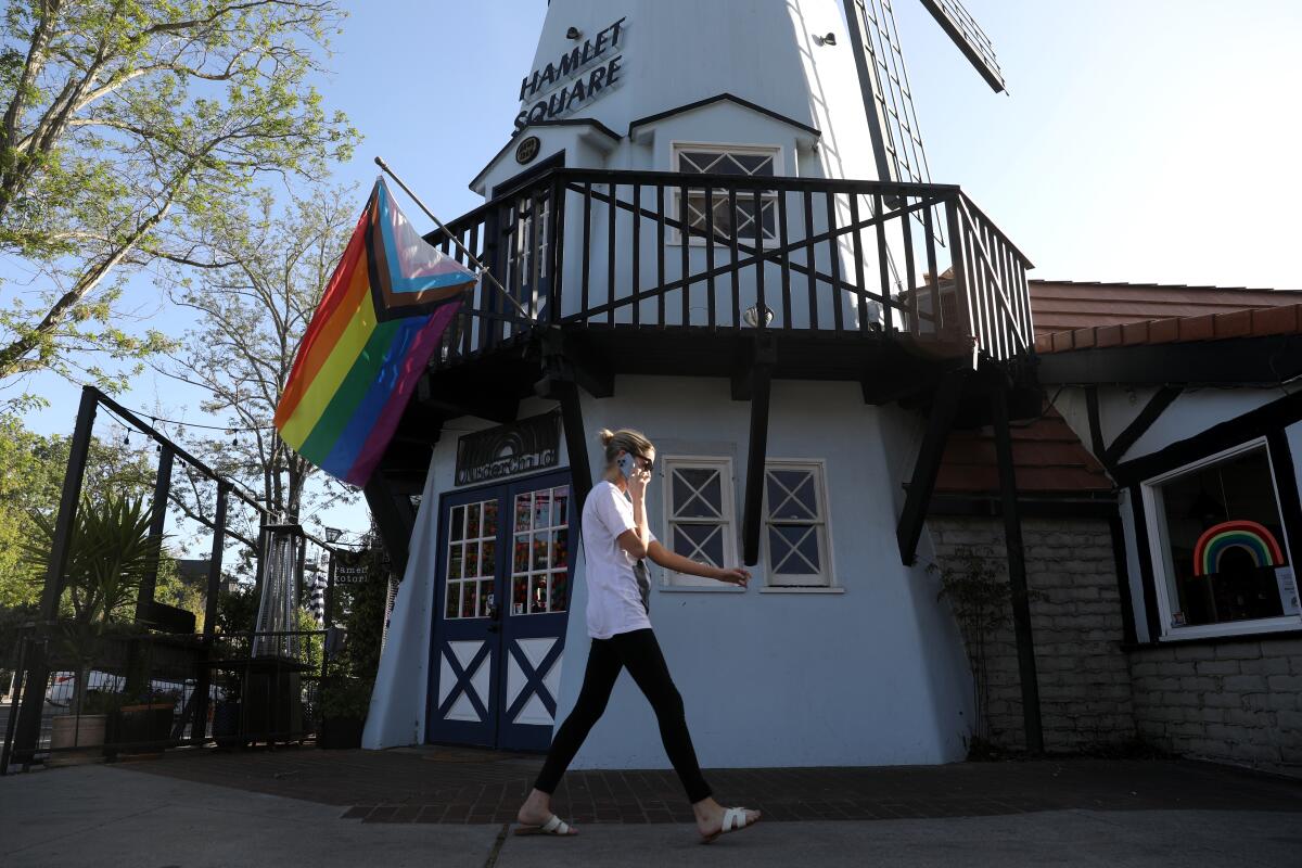 ONEderchild, a toy store, with a progress pride flag along Copenhagen Drive in Solvang on Tuesday, April 25, 2023.