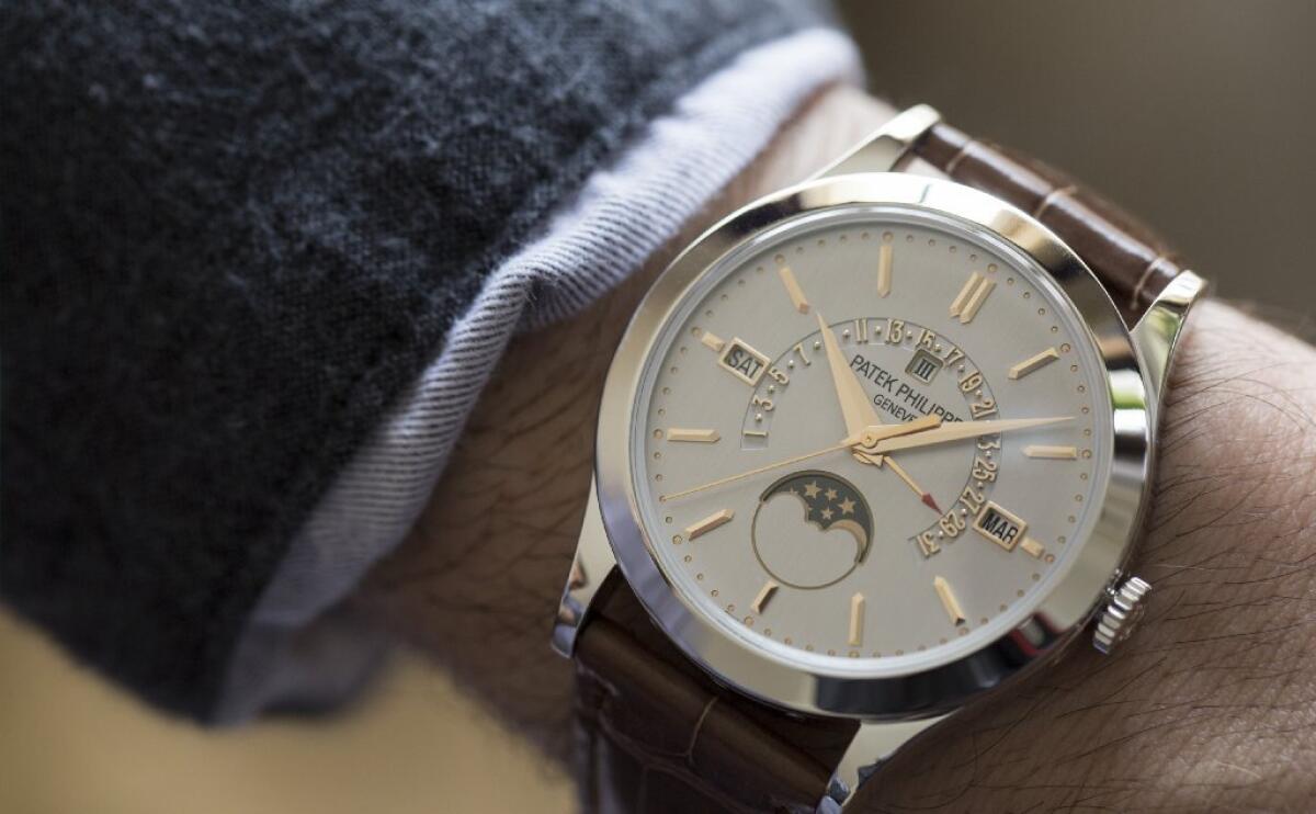 A rose-gold men's watch from Patek Philippe's Complications collection.