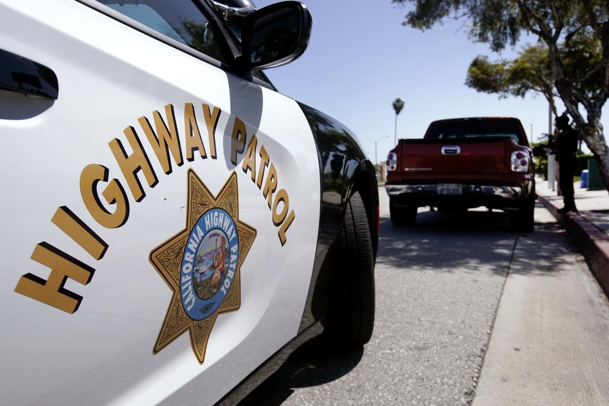 California Highway Patrol officer stops a motorist along Interstate 5 who is suspected of speeding.