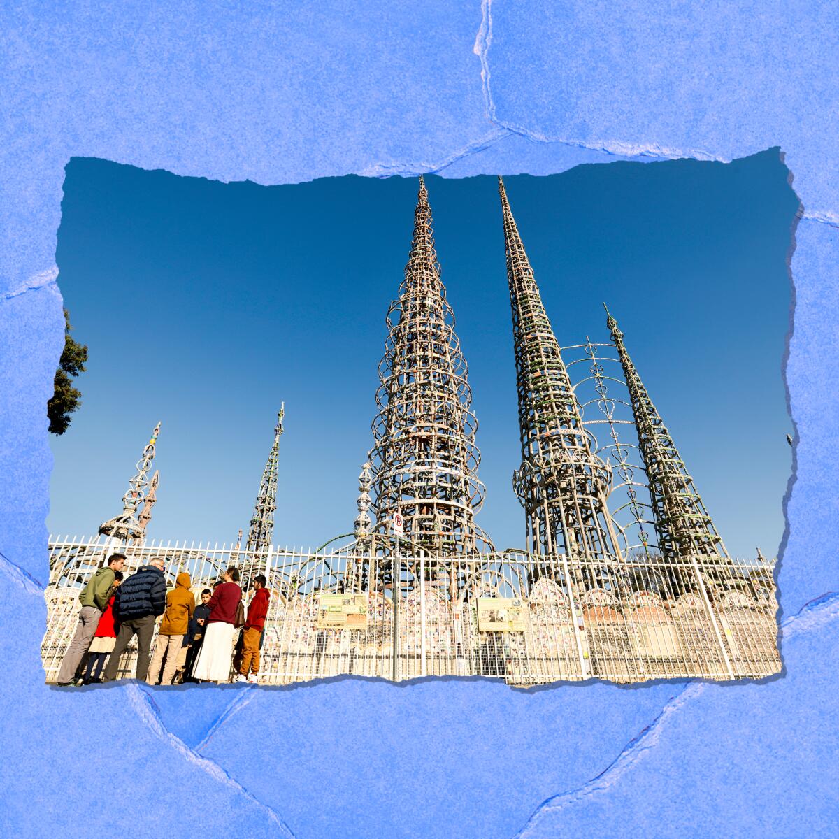 People stand on a sidewalk near multiple spires of wire that rise into the air. 