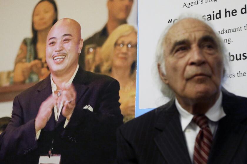 Raymond "Shrimp Boy" Chow, depicted at left, pleaded not guilty Tuesday to money laundering and other federal charges in San Francisco. At right is his attorney, J. Tony Serra.