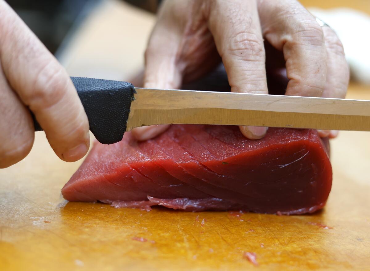 Slicing local bluefin tuna for carpaccio.