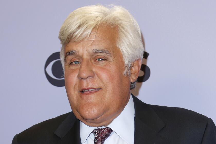 Jay Leno wearing a suit