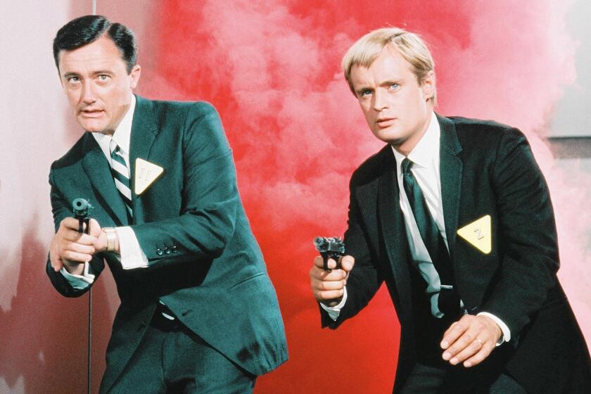 Robert Vaughn, left, as Napoleon Solo and David McCallum as Illya Kuryakin in the mid-1960s TV series "The 'Man from U.N.C.L.E."