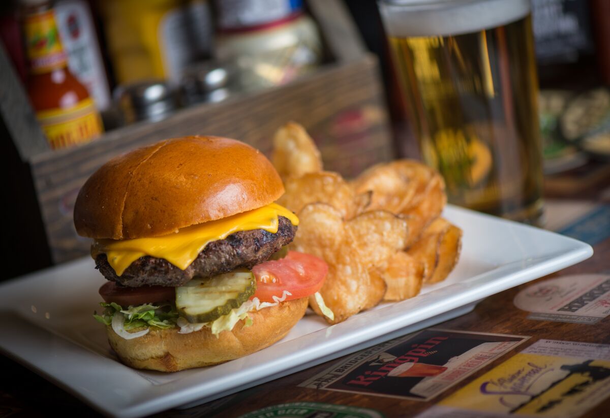 The All-American, the signature burger at Cold Beers & Cheeseburgers, which opened Oct. 29 in Carlsbad Village.