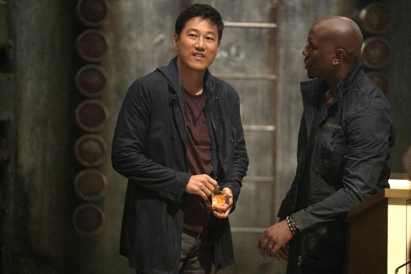 (from left) Han (Sung Kang) and Roman (Tyrese Gibson) in "F9", co-written and directed by Justin Lin.