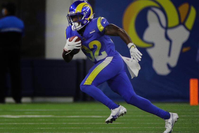 INGLEWOOD, CA - AUGUST 14, 2021: Los Angeles Rams running back Otis Anderson (32) finds some open field against the Chargers at SoFi Stadium on August 14, 2021 in Inglewood, California.(Gina Ferazzi / Los Angeles Times)