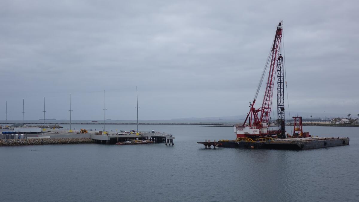 A barge-mounted crane at Naval Weapons Station Seal Beach on April 12. 