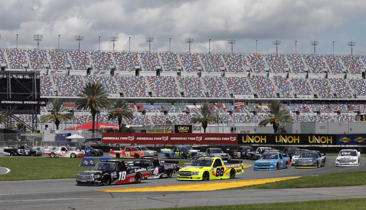 Christian Eckes leads the field through the road course during a NASCAR Truck Series auto race at Daytona International Speedway, Sunday, Aug. 16, 2020, in Daytona Beach, Fla. (AP Photo/Terry Renna)
