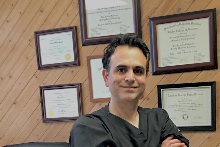 Dr. Bahmanpour at his private practice office