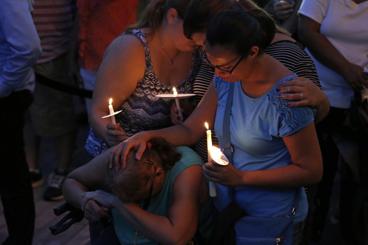 Thousands gathered for a memorial rally in downtown Orlando, Fla., on Monday to honor those killed and wounded in the Pulse nightclub attack.