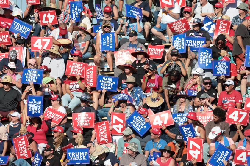 Coachella, California October 12, 2024-Donald Trump supporters brave the heat during a rally at Calhoun Ranch in Coachella Saturday.(Wally Skalij/Los Angeles Times)