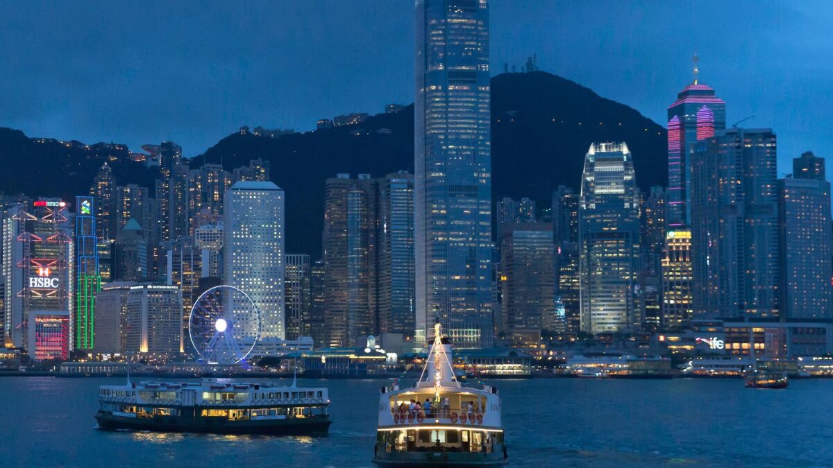 Britain handed Hong Kong over to China 20 years ago. Now the fear is that Hong Kong "becomes just another Chinese city," says one Asia investment strategist.