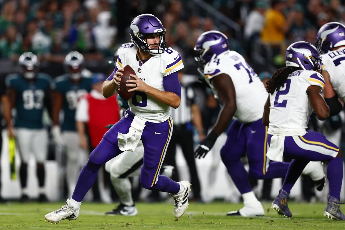 Vikings quarterback Kirk Cousins sets to throw against the Eagles in a Week 2 loss. 