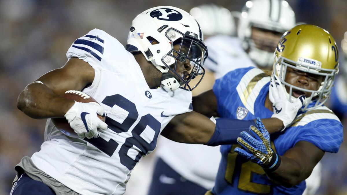 Running back Adam Hine and Brigham Young are back on the road Saturday at Michigan after a 24-23 loss to linebacker Jayon Brown and UCLA last weekend at the Rose Bowl.
