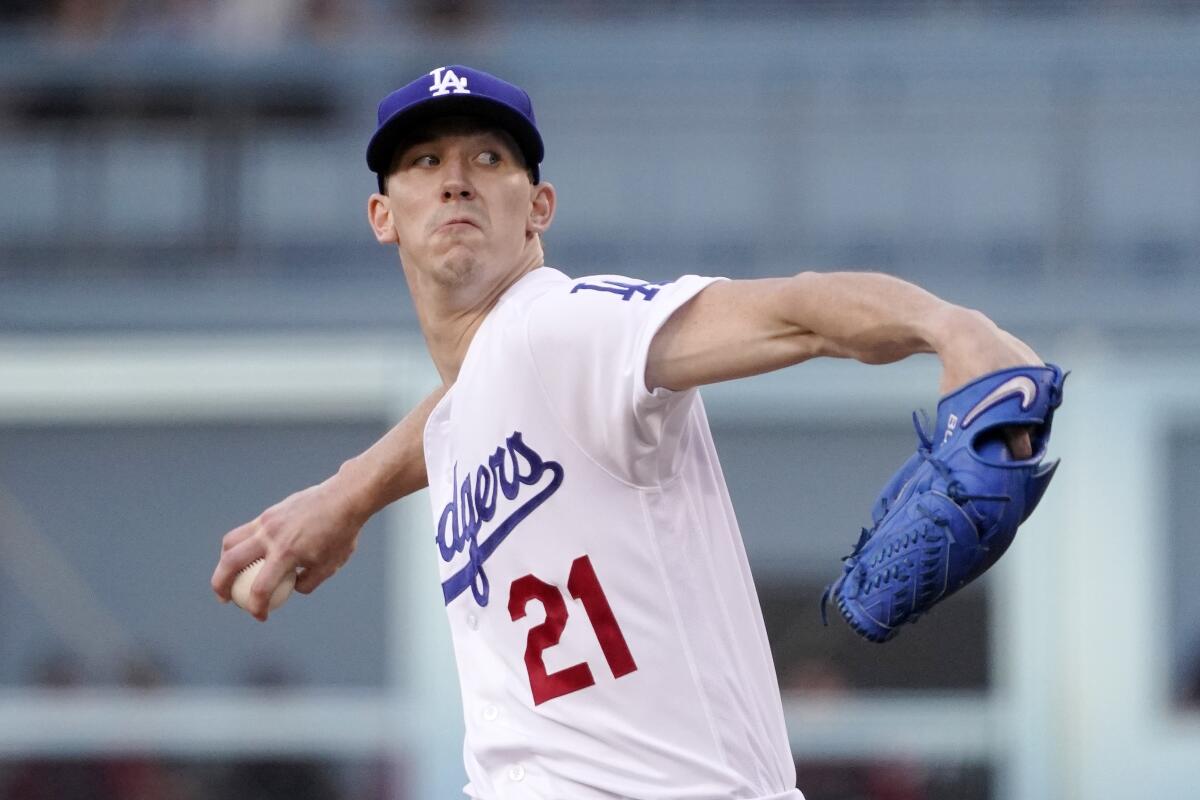 Dodgers starting pitcher Walker Buehler throws during the first inning Saturday.