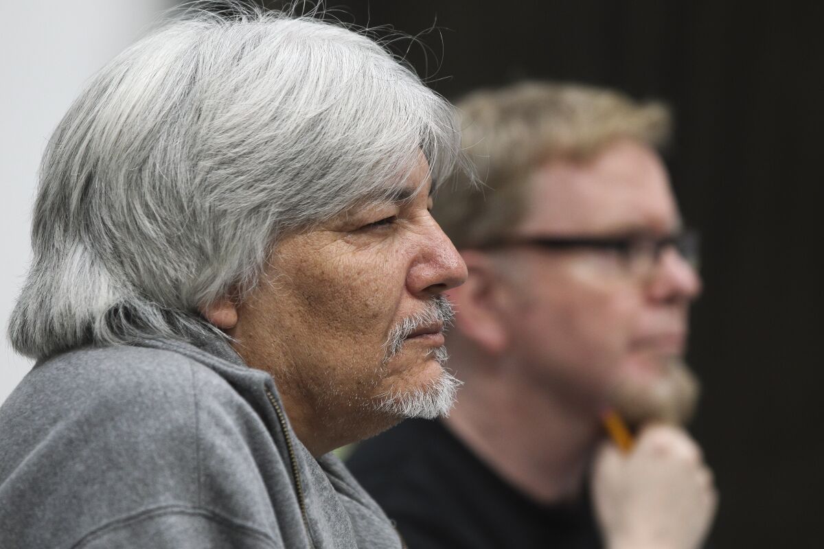 Director Javier Velasco (left) and musical director-arranger Steve Gunderson watch a rehearsal for "33 1/3: House of Dreams" at San Diego Rep's rehearsal hall in Chula Vista.